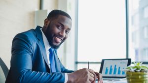 African MAn Smilling - Elite Africa