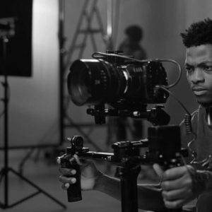 African young man shooting video